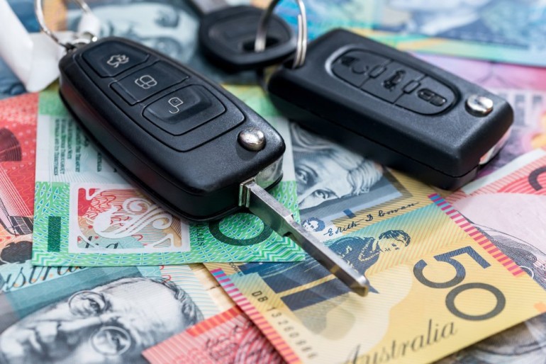 Car Keys on Pike of Money